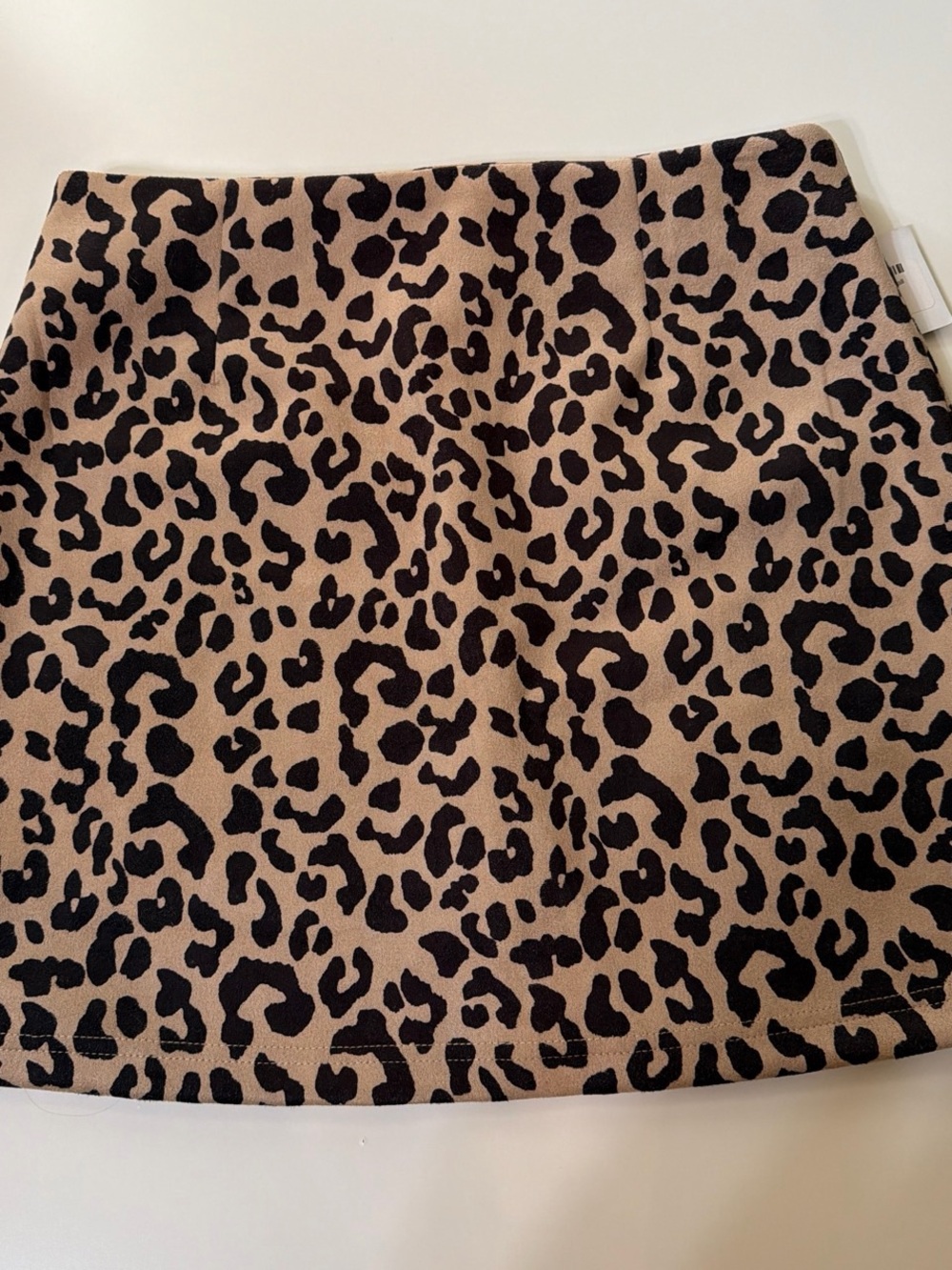 Crescent Leopard-Print Mini Skirt in Tan and Black